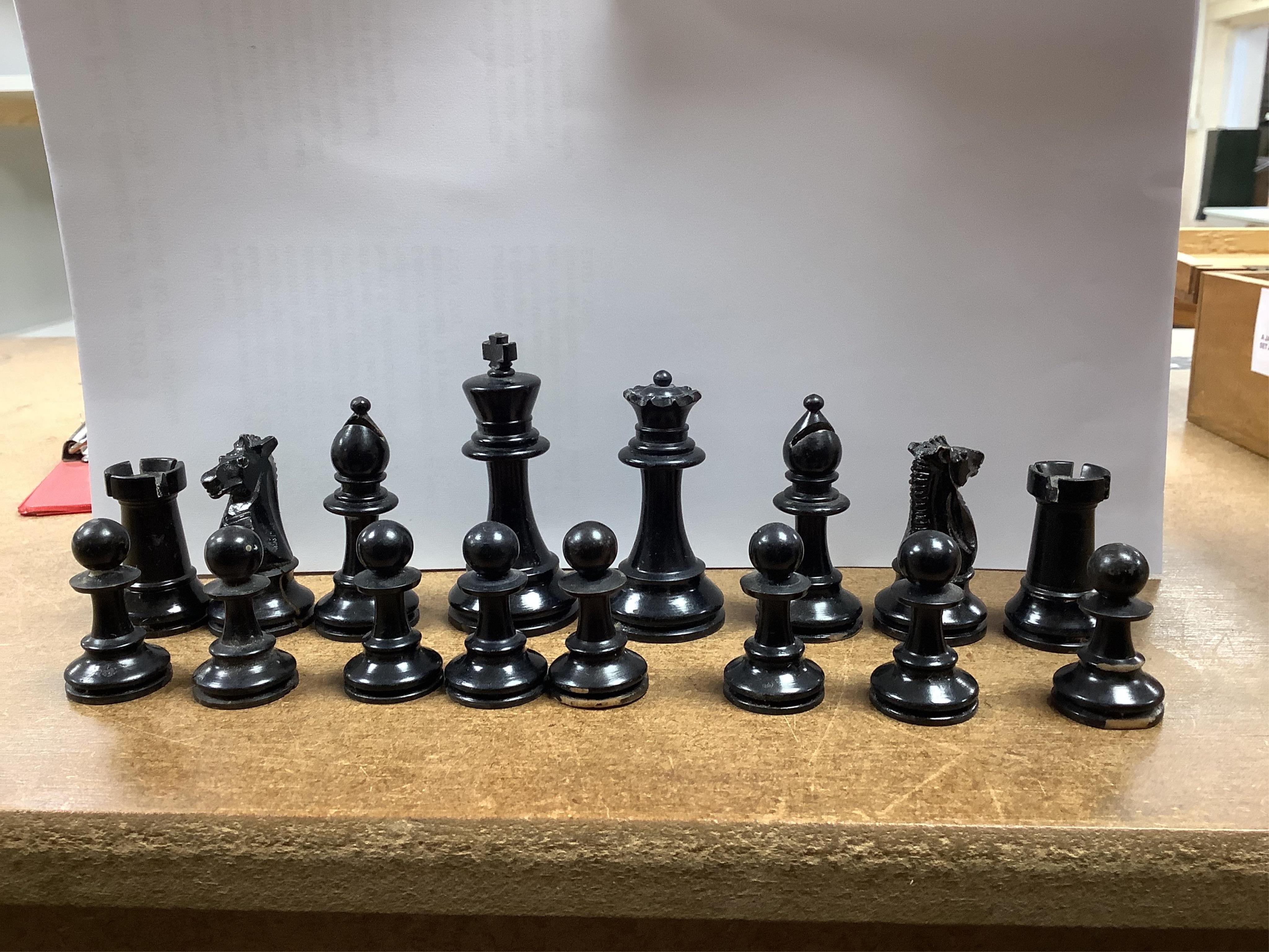 A chess set, possibly F H Ayres, in a mahogany box, and another larger weighted chess set, in box, Ayres Kings 6cm. Condition - good